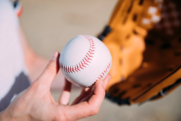 Free photo teenage player with baseball and glove