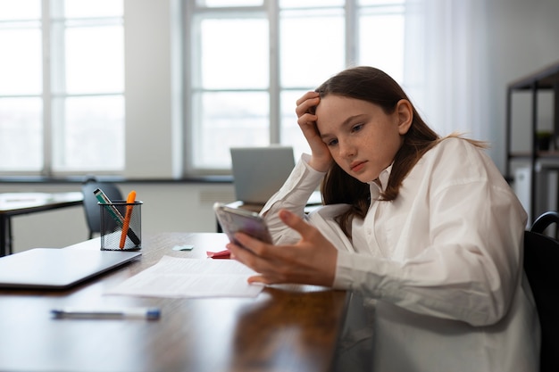 Teenager being cyberbullied