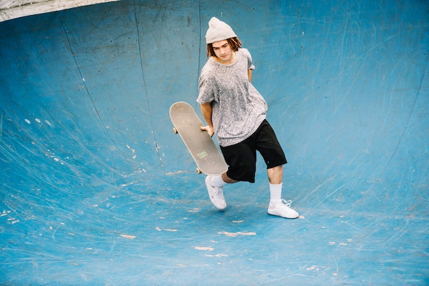 Free photo teenager on bottom of bowl