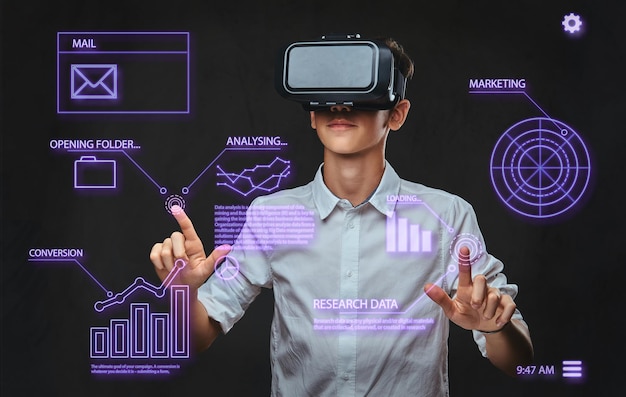 Teenager dressed in a white t-shirt using virtual reality glasses with graph charts, numbers, lines. Technology concept.