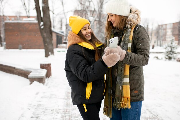 Teenager friends having fun in winter time