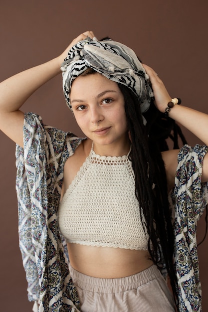 Teenager girl with hippie clothes and dreadlocks