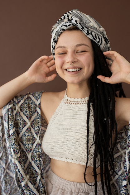 Teenager girl with hippie clothes and dreadlocks