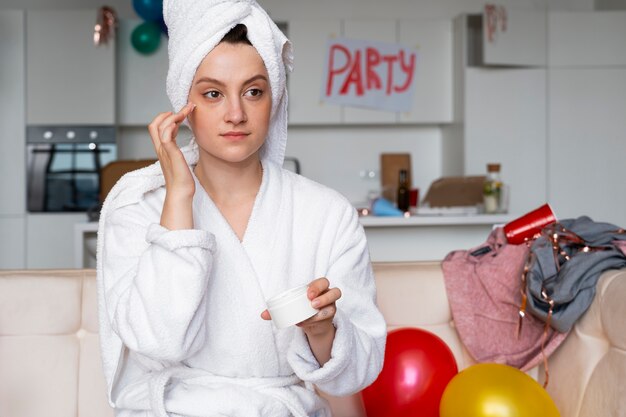 Teenager having a hangover ritual