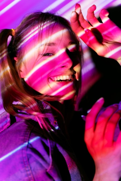 Teenager in the light of movie projector