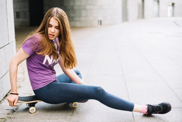 Teenager moving skateboard