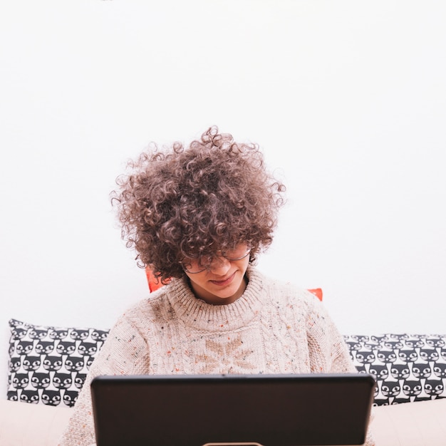 Teenager using laptop