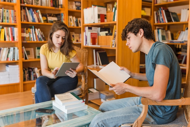 Free Photo teenagers with tablet and book studying