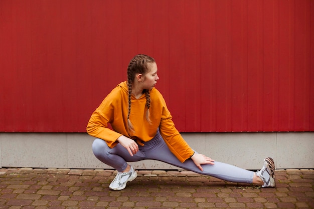 Free photo teenagers working out outdoors