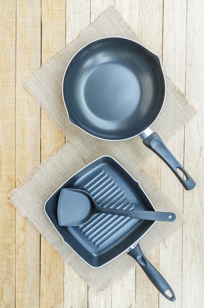 Teflon pan on wood table