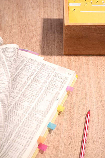 Telephone directory on table high angle