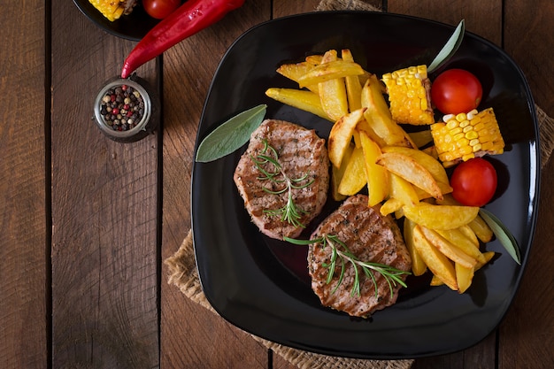 Free Photo tender and juicy veal steak medium rare with french fries