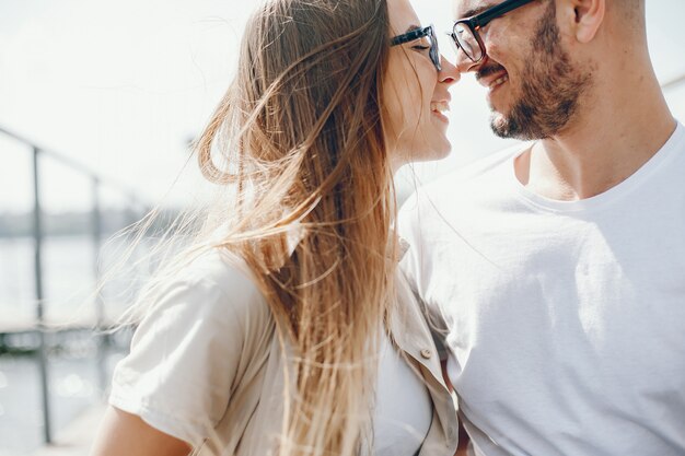 tender and merry lovers are having a good time at the lake