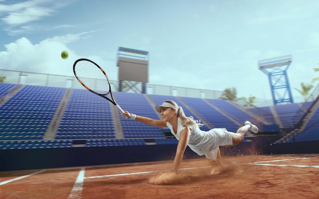 Tennis girl on a professional tennis court