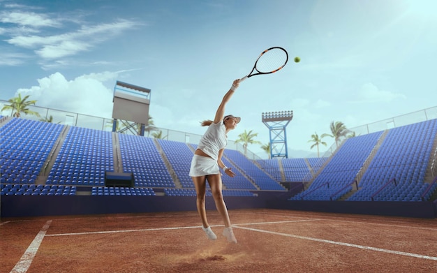 Tennis girl on a professional tennis court