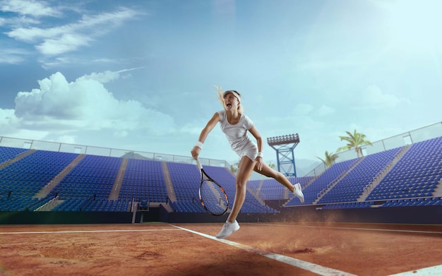 Tennis girl on a professional tennis court