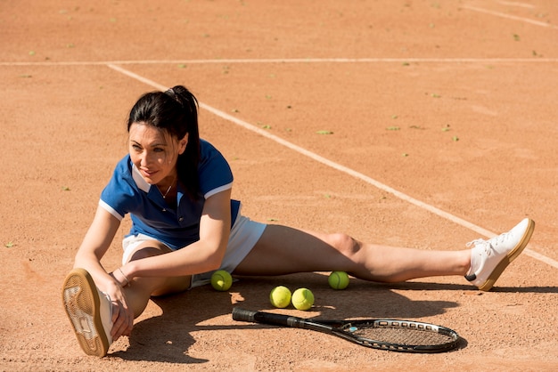 Tennis player with her racket