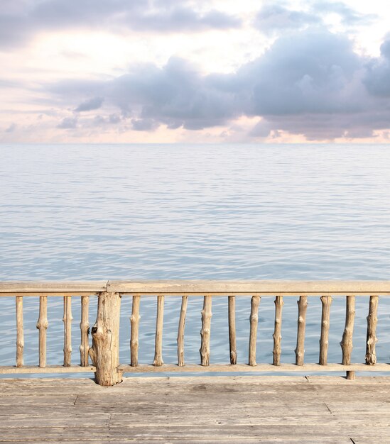 terrace view with blue sea and cloudy sky