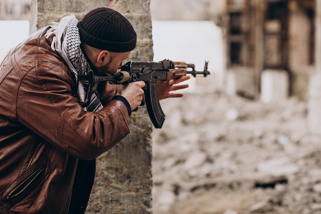 Free Photo terrorist with gun fighting with soldiers