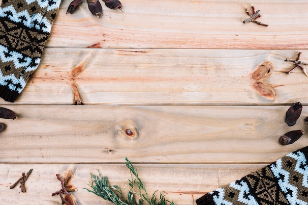 Free photo textile near fir needles on wood board