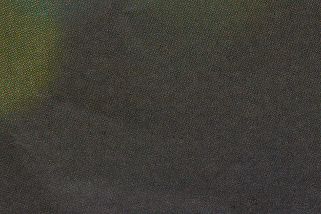 Free photo texture of dark fabric with yellow stain