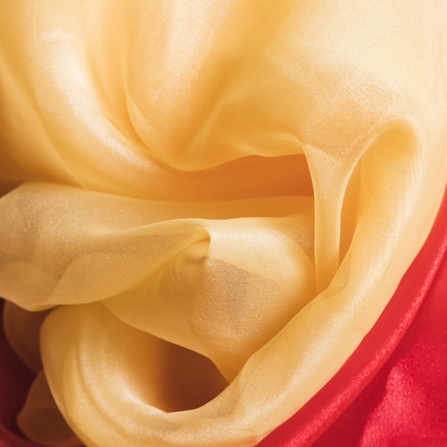 Free Photo texture of orange and red crumpled fabric