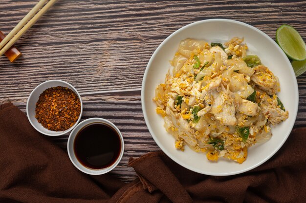 Thai food. Fried noodle with pork in soy sauce and vegetable