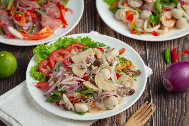 Thai food ;mixed spicy pork sausage salad with vermicelli noodle