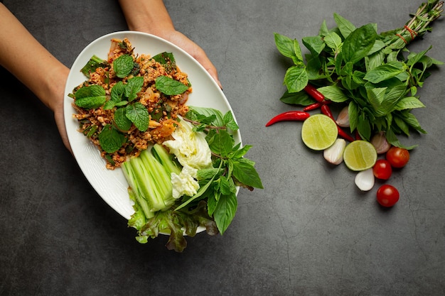 Thai food;spicy minced pork serve with side dishes