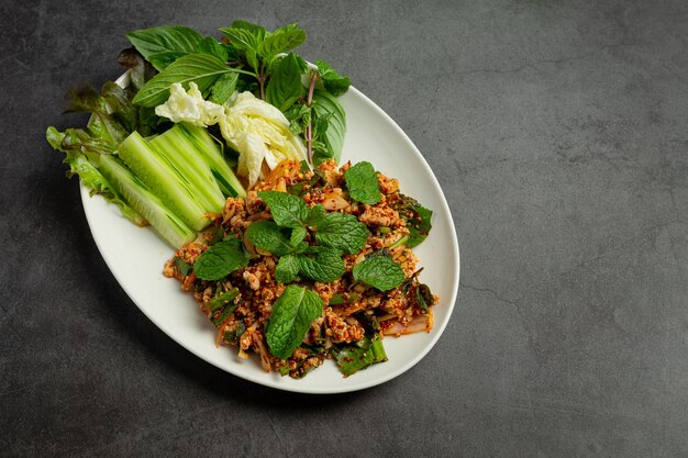 Thai food;spicy minced pork serve with side dishes