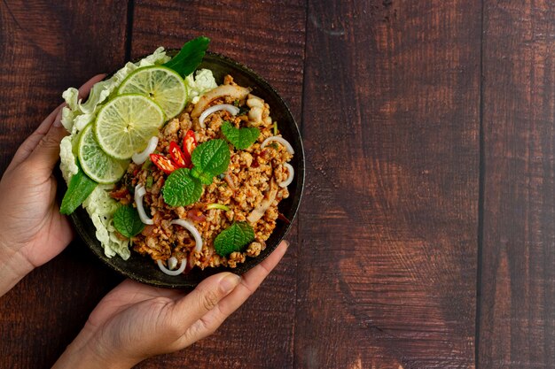 Thai food with spicy minced pork serve with side dishes