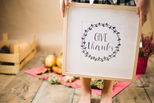 Thanksgiving concept with kid walking with frame