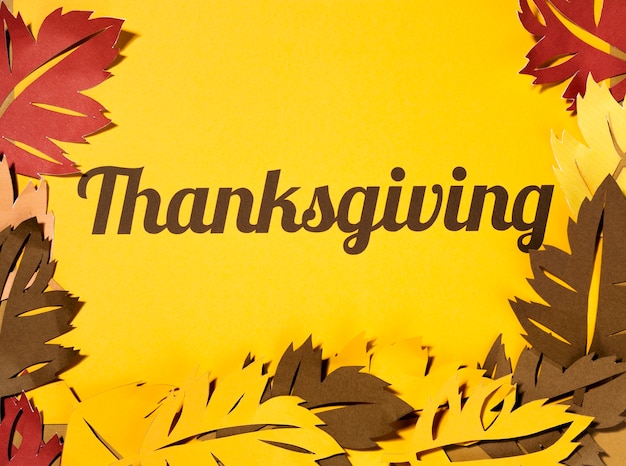 Thanksgiving lettering with big leaflets on paper 