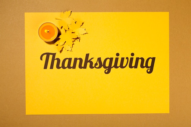 Free Photo thanksgiving lettering with candle