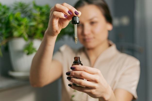 Therapist with serum bottle