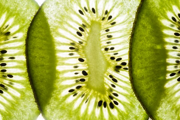 Thin slices of juicy kiwi fruit