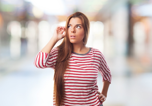 Free Photo thinking female on a blurry background