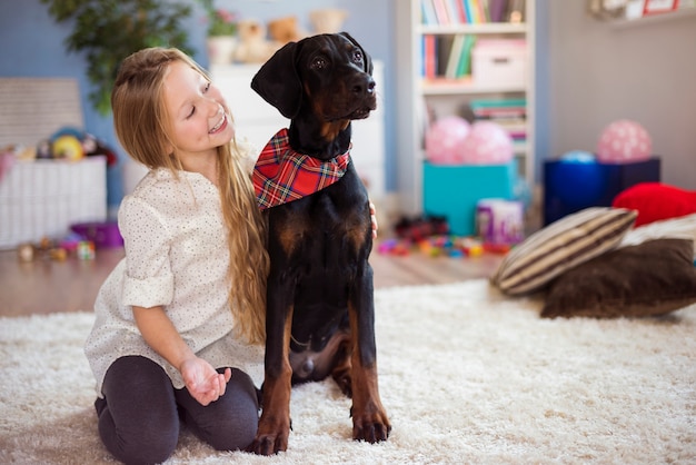 Free Photo this doberman is her best friend