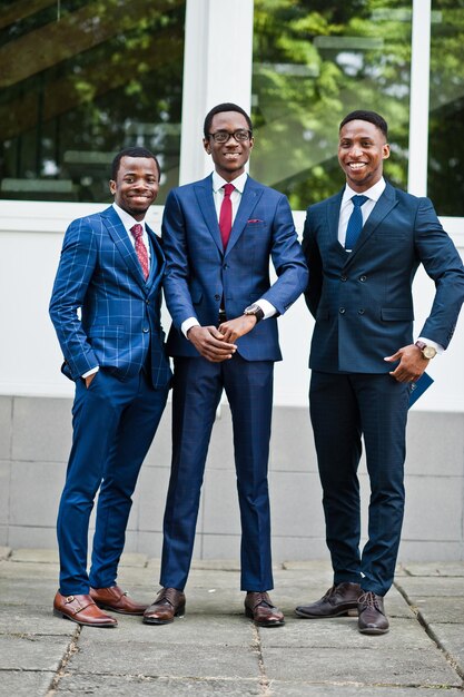 Three african american happy successful mans at suit