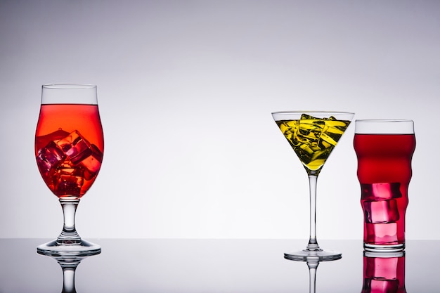 Free Photo three elegant cocktails