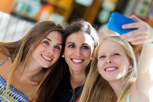 Three girls taking a selfie