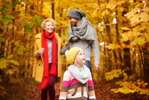 Free photo three members of family in woods