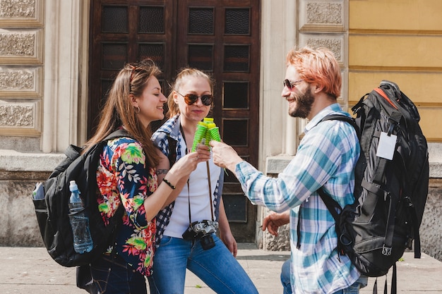 Free photo three tourists eating ice cream