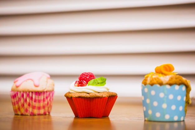 Free photo three various muffins