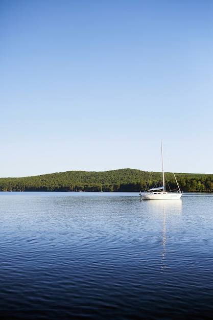 Free Photo time of peace. boat lake