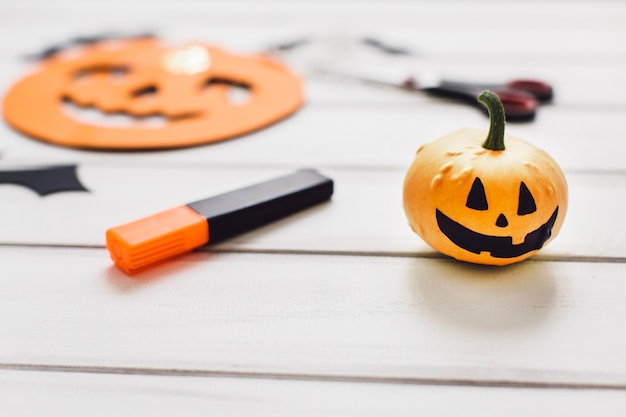 Free Photo tiny halloween pumpkin with face