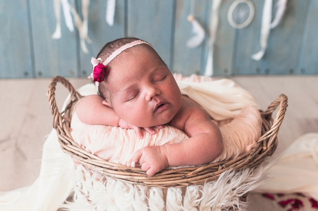 Tiny wonderful baby in basket