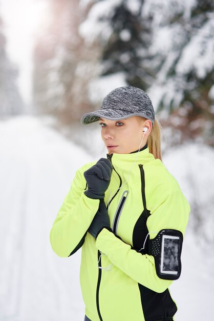 Tired female athlete taking a short break