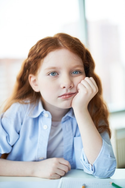 Tired girl at school