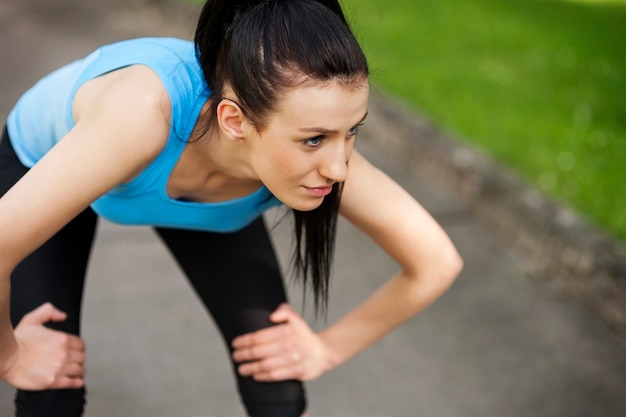 Free photo tired woman after jogging